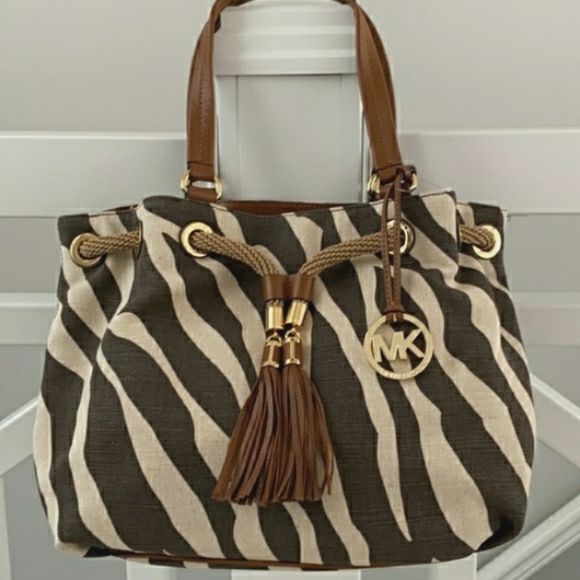 Michael Kors Handbags - Gorgeous Michael Kors Zebra Print Tote 13x11x6 Great for all seasons!